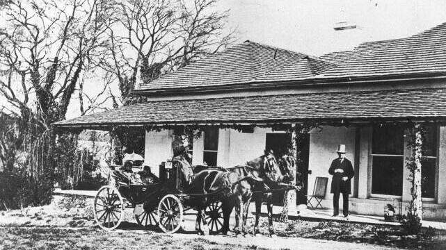 Cooerwull House in the 1860s with Andrew Brown, Christina Brown and daughter Grace in the carriage.