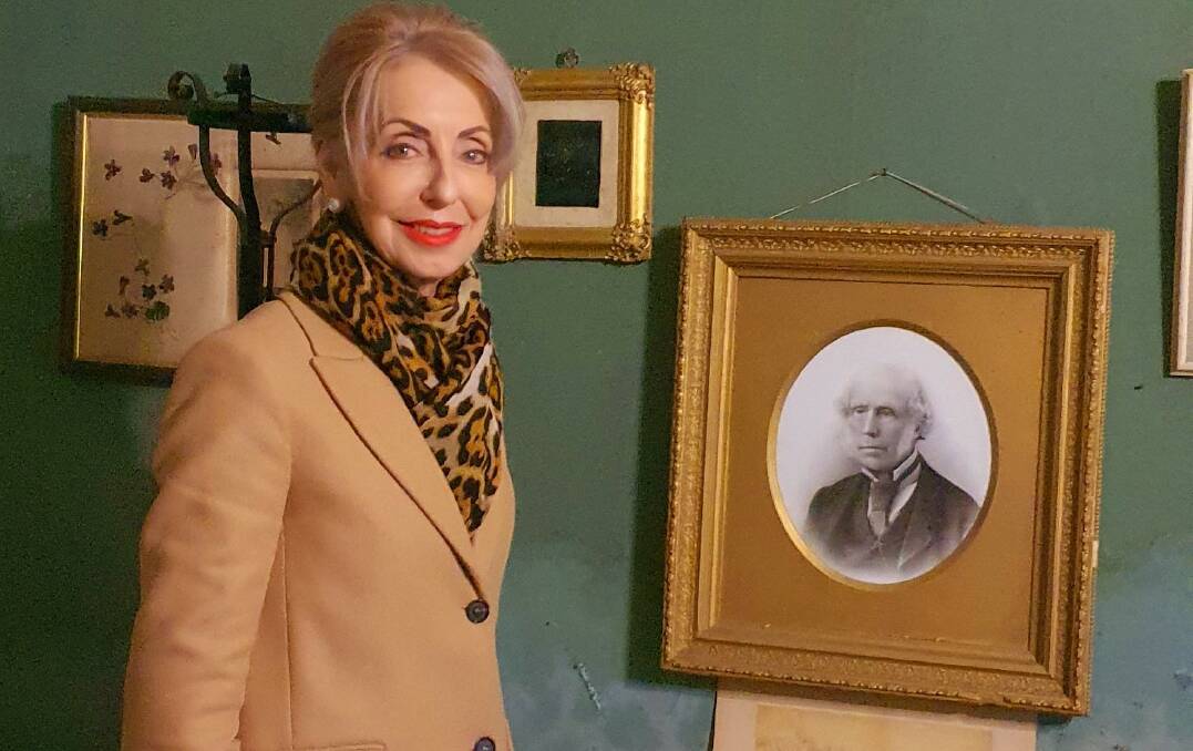 Mayor of Lithgow, Maree Statham with a portrait of Andrew Brown at Cooerwull House. Picture supplied. 