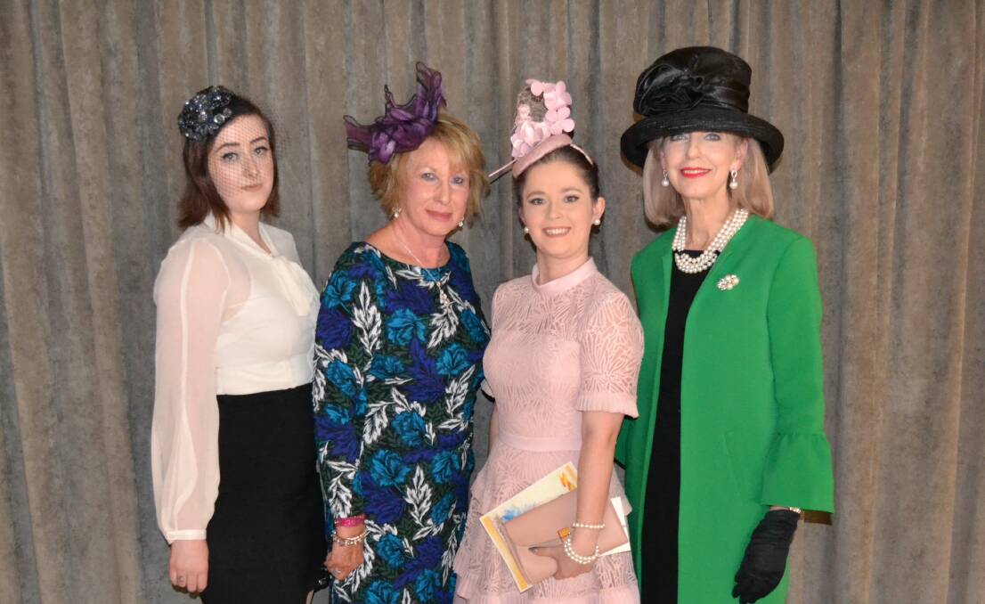 WINNER: Judges Kira Lewicki, Cherly Schram and Maree Statham, with Lithgow Workies fashion competition winner Angie Cambourn (pictured, blush dress). Photo: BRADLEY JURD