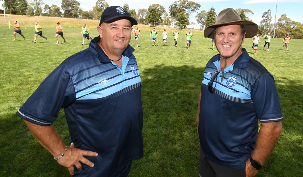 HARD WORK: NSWRL Referees operations manager Paul Kalina and  NSWRL Referees high performance manager Stuart  Raper at CSU's University Oval, running a coaching clinic on Saturday afternoon. Photo: CHRIS SEABROOK 012018crefs1