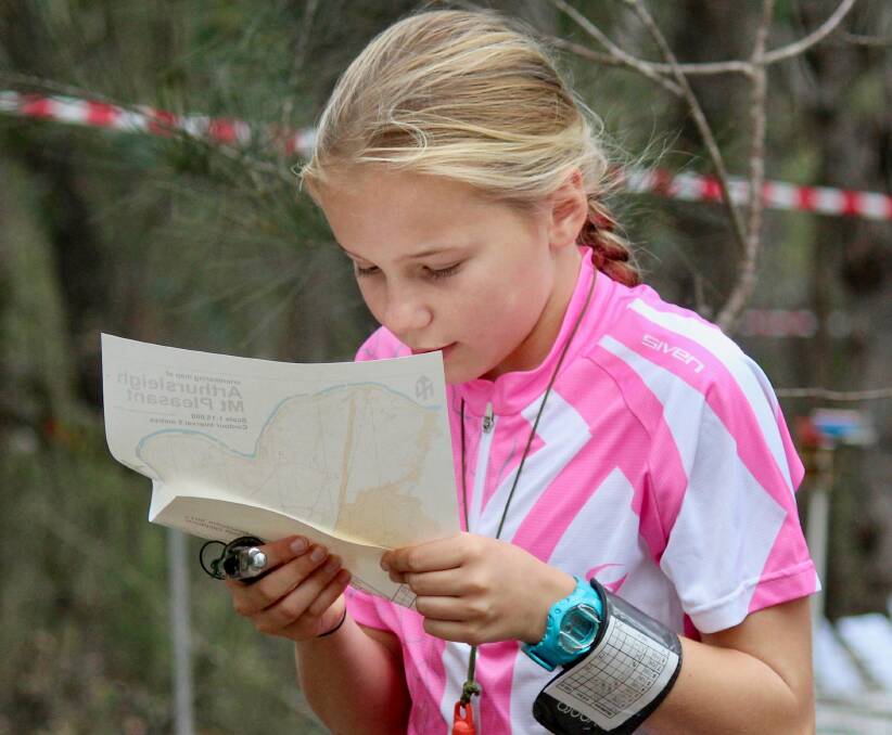 ORIENTEERING: Nea Shingler, from Sydney, in action during an orienteering event. She is a member of the NSW Orienteering school team. Photo: SUPPLIED
