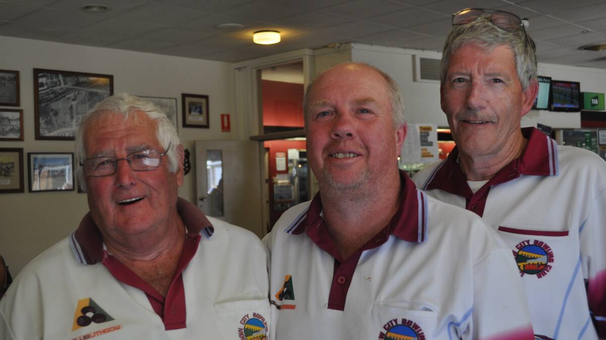 NOT A BAD WEEKEND: Athol Roach and Mike Johnson were all smiles when they received their $1200 first prize from men's sub-body president Dave Robson.