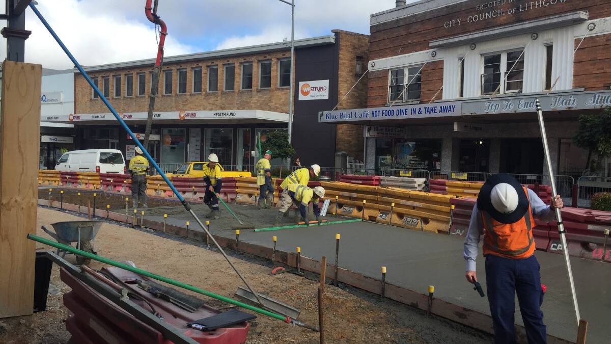 Concrete has almost been completed at Cook Street Plaza and brick laying has begun. Picture: KIRSTY HORTON. 