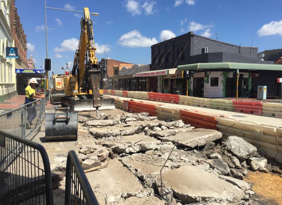 MAIN STREET: Tearing up Main Street this week so they can lay new concrete on the road. Picture: KIRSTY HORTON. 