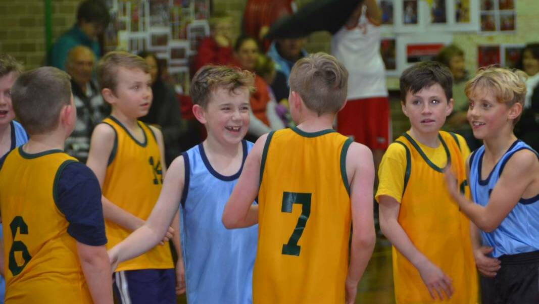  A few junior boys basketballers after their grand final in June. 