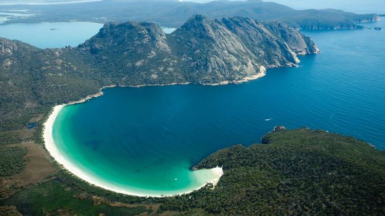 Picture perfect. The view of Wineglass Bay is worth the climb. Photo: Chris Bray Photography