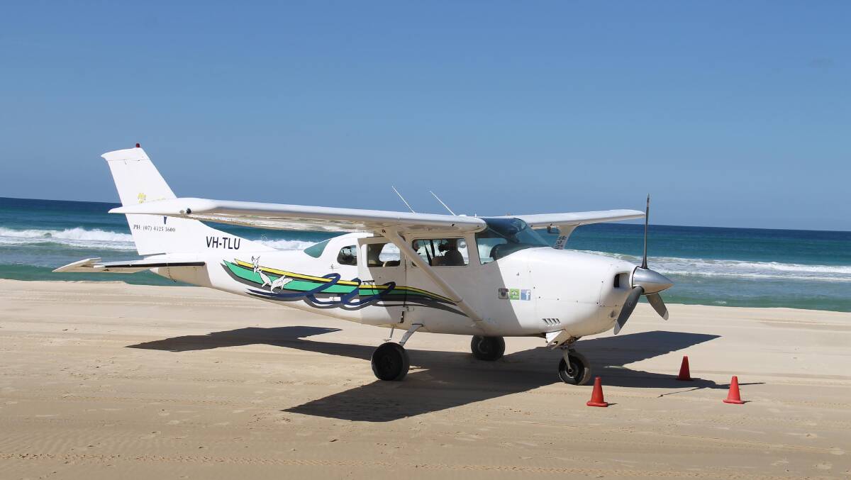 Getting ready for an aerial adventure … Air Fraser Island takes off and lands on 75-Mile Beach. 