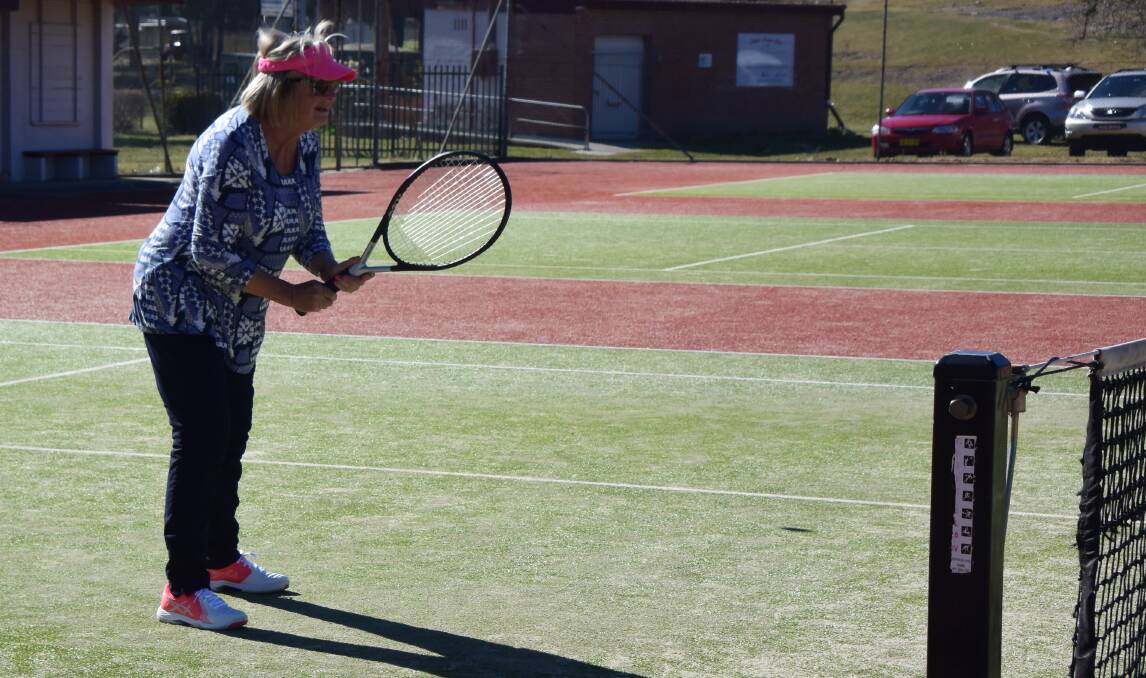 GAME TIME: Carolyn Andison gets ready to return a serve at Lithgow tennis court. Picture: PHOEBE MOLONEY. 