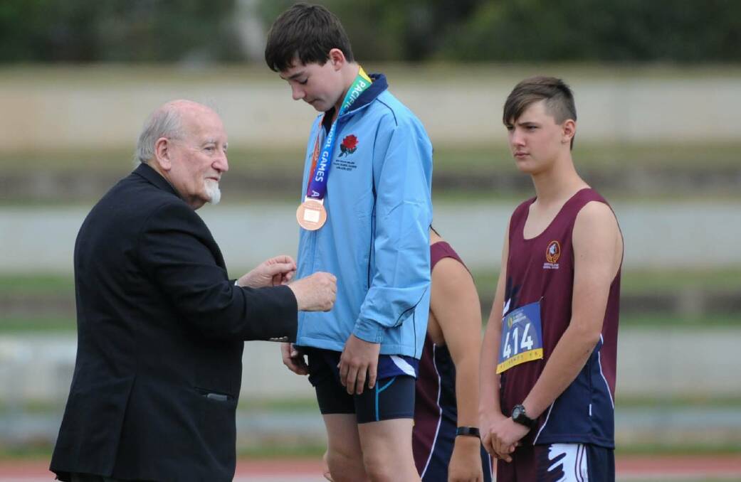 AWARD WINNING: Angus Clues being awarded a bronze medal at the Pacific School Games. Picture: SUPPLIED.