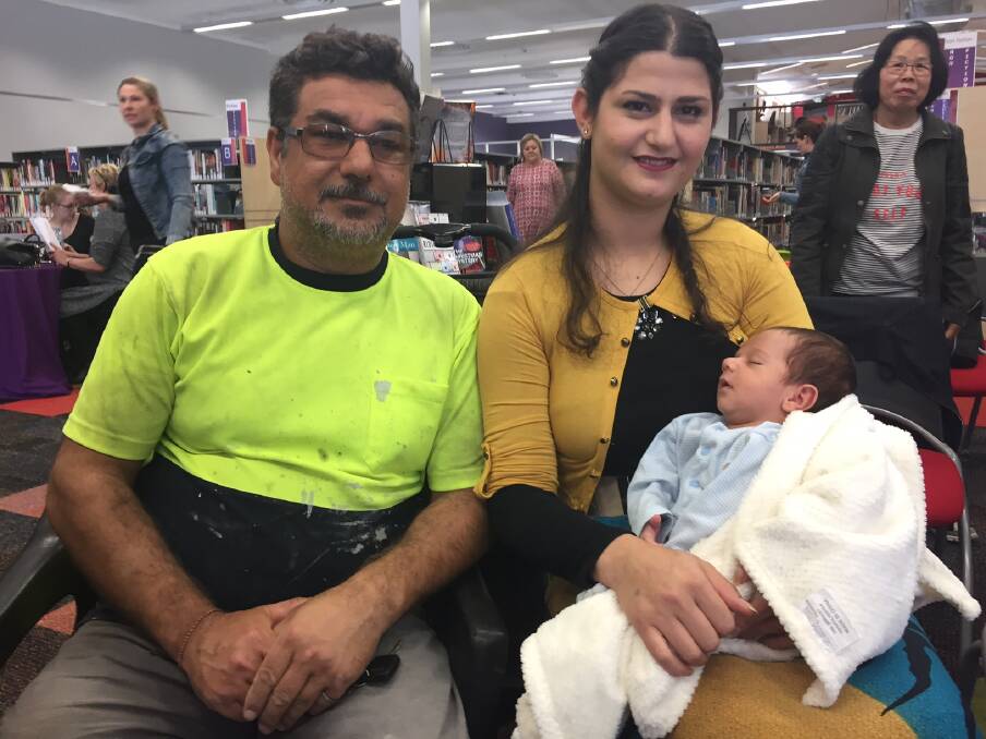 PEACE SEEKING: Nawwaf Mirza and Salwa Bashar celebrated Harmony Day in Lithgow with their newborn Roy. Picture: PHOEBE MOLONEY. 