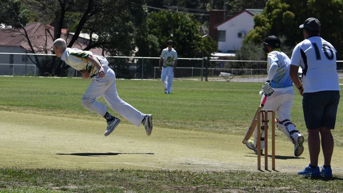 FLYING START: Aron Crowder putting everything into his bowling for Valley in the opening innings of the major grand final. Picture: PHOEBE MOLONEY. 