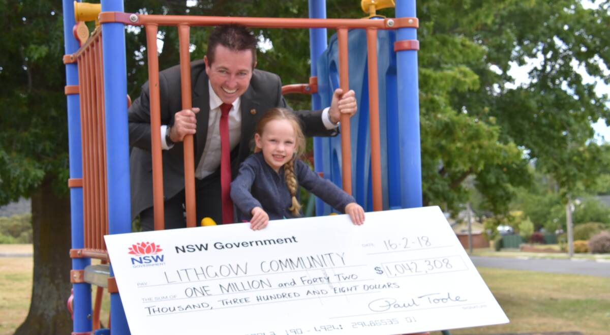 FROM SMALL THINGS: MP Paul Toole with Lithgow's Hannah Garvey at Endeavour Park's current playground. Picture: PHOEBE MOLONEY. 