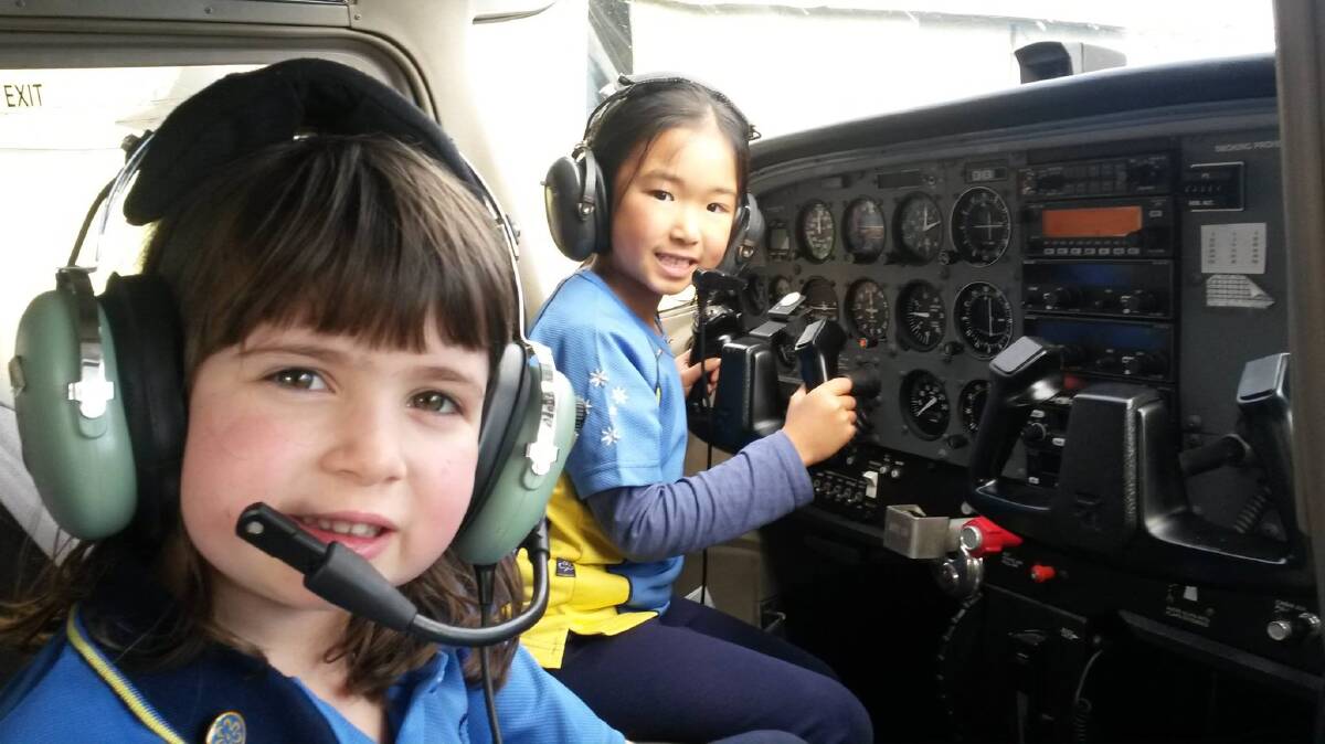REFORMING: Girl Guides take to the sky in pilot training as part of the Guides program. The opportunity to earn a Private Pilot Licence is just one of the many activities Guides are given the choice to partake in.