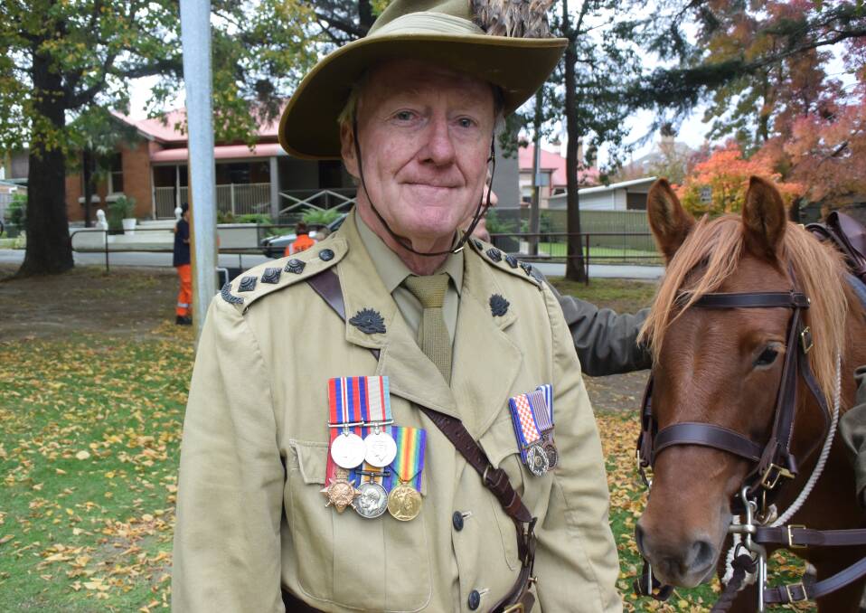 LIGHT HORSE: Gary Johnson's grandfather fought in the charge of Beersheba 100 years ago. He stands with the war horse Charm. 