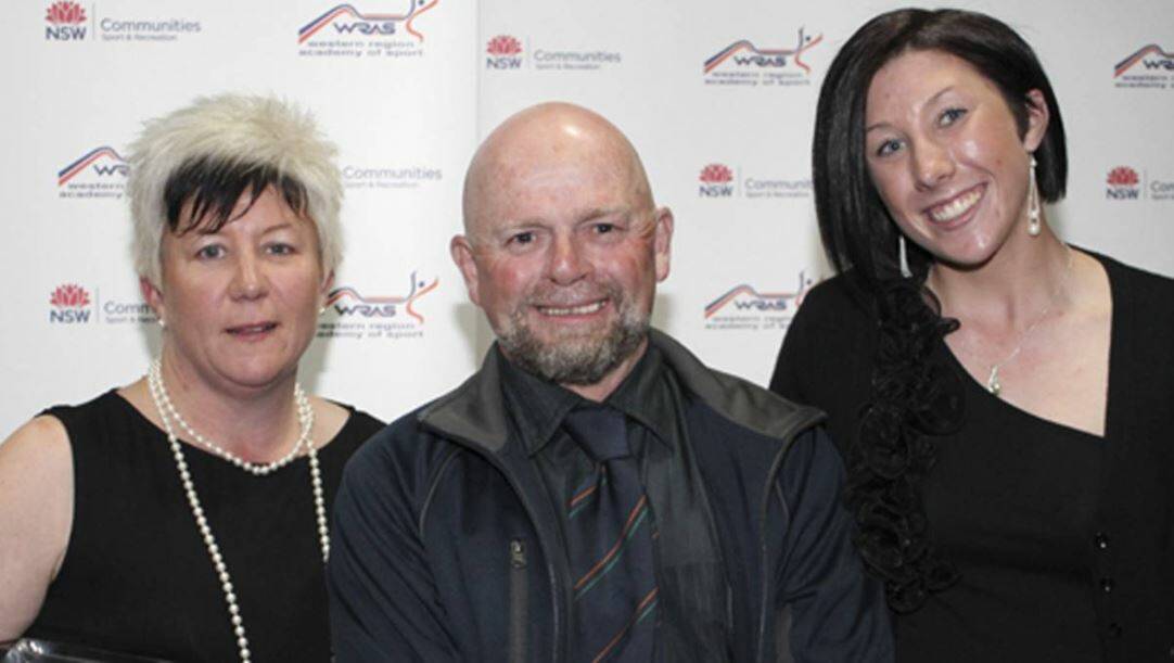 STAR COACH: Wayne Gaynor at the Western Region Academy of Sport's gala in 2012 with Michelle and Tamika Bostock. 