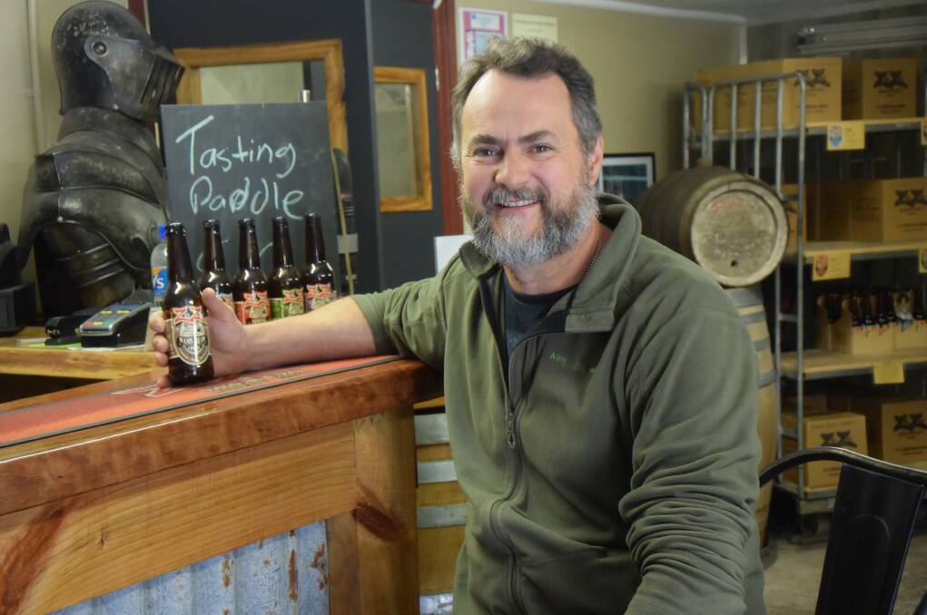 SWEET SUCCESS: Adrian Schindler in the brewery's old bar. Picture: PHOEBE MOLONEY.