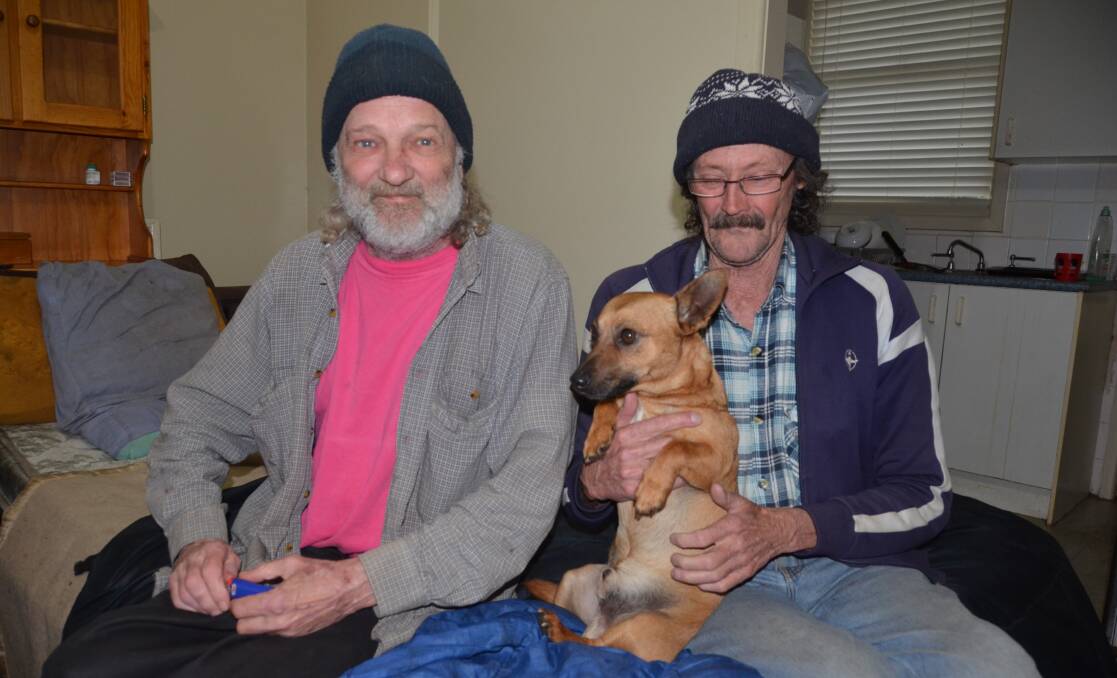 "IT'S BEEN A BATTLE": John Opera and Frank Butler have been sleeping in their lounge rooms for five months. Picture: PHOEBE MOLONEY. 