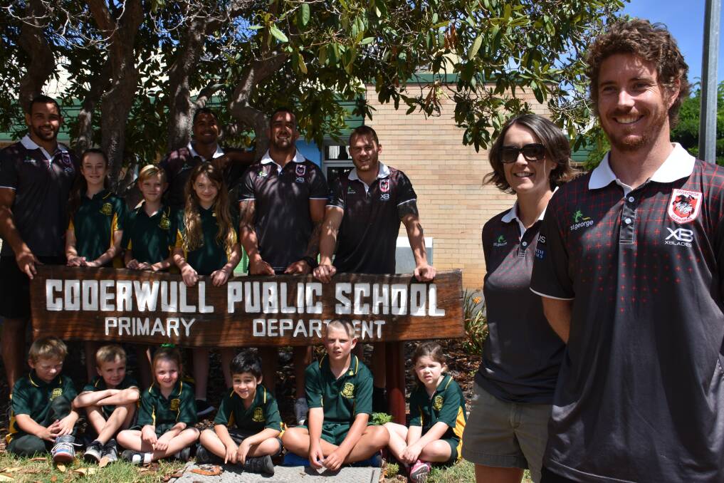 BACK TO SCHOOL: Former Cooerwull students Jo Banning and Steven Dean (right) are the publicity officer and physiotherapists of the St. George Illawarra Dragons. 