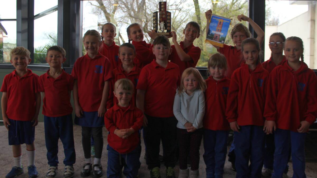 WHAT A WIN: Capertee Percussion Ensemble with their first-prize trophy. Picture: SUPPLIED. 
