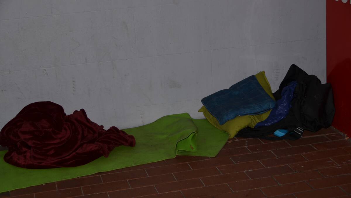 SIGNS OF LIFE: Mattresses, blankets and bags left in the nooks and crannies of Main Street in Lithgow.  
