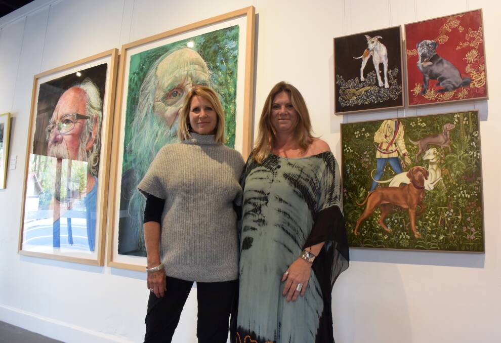 SOUND AND VISION: Gallery director Sharon Howard with Kaylene Brooks in front of works by David Newman-White and Colette Jonquieres. Picture: PHOEBE MOLONEY. 