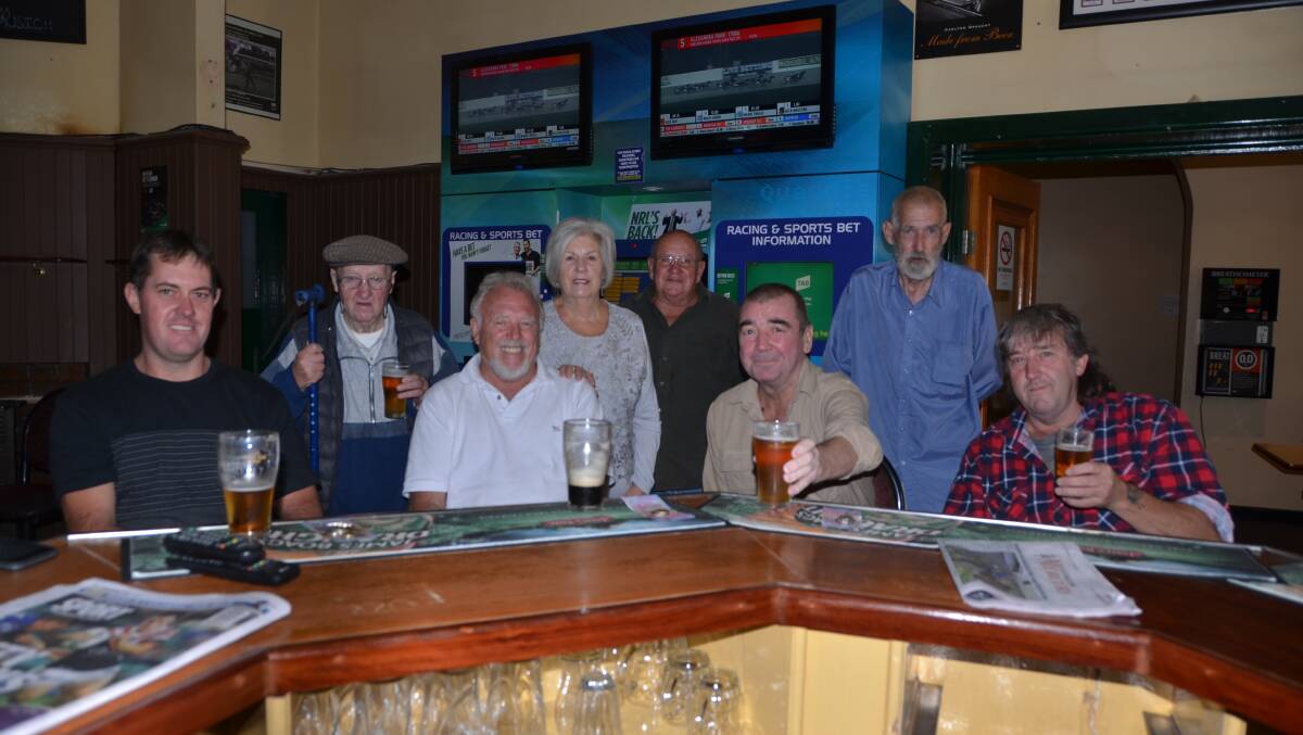 THE REGULARS: Mitch Vandervelden, Patrick 'Nicko' Ryan, former publican Ray Smith,  Heather Thompson, Bill Thompson, Bill Boundy, Kevin Rowe and Tom Legge. Picture: PHOEBE MOLONEY