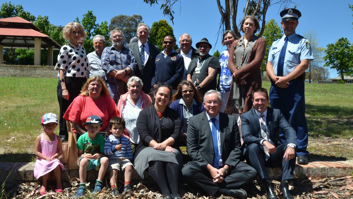 FUNDING FOR EMORA PARK: NSW Minister for Housing Brad Hazzard and Paul Toole MP with community members at the new playground location when its funding was announced in 2016.