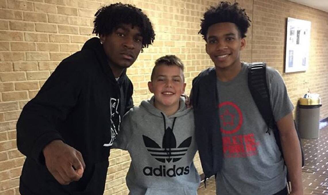 DREAM TOUR: Corey Honey with basketballers Emmanuel Calton and Joshua Nunn (right), who play for the University of Dallas. Picture: SUPPLIED. 