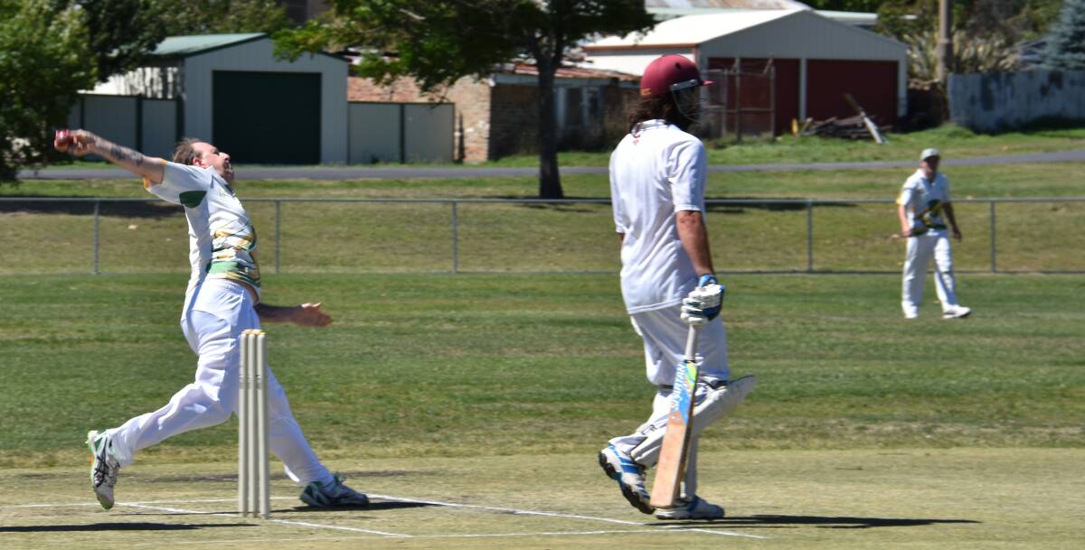 SWINGING: Chris Giugni bowling for Lithgow Valley in the opening innings of the final. 