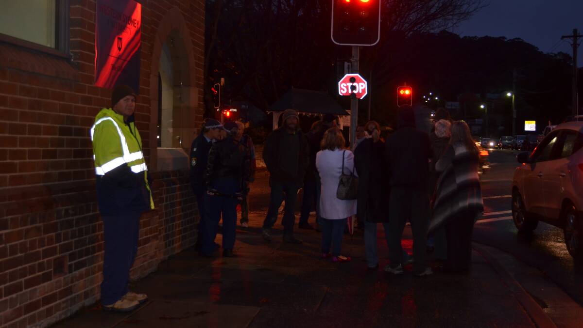 Anti-mosque protesters stood outside a forum on Islam held at the Western Sydney University campus in Lithgow. 