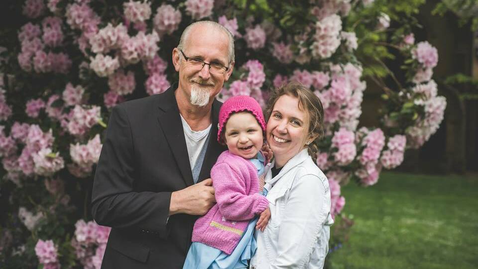 TOGETHER: Paul Phillips and Jo McClelland with their daughter Vianne at friends Rich and Kellie Evans' vow renewals at Hoskins Church. Picture: SUPPLIED. 