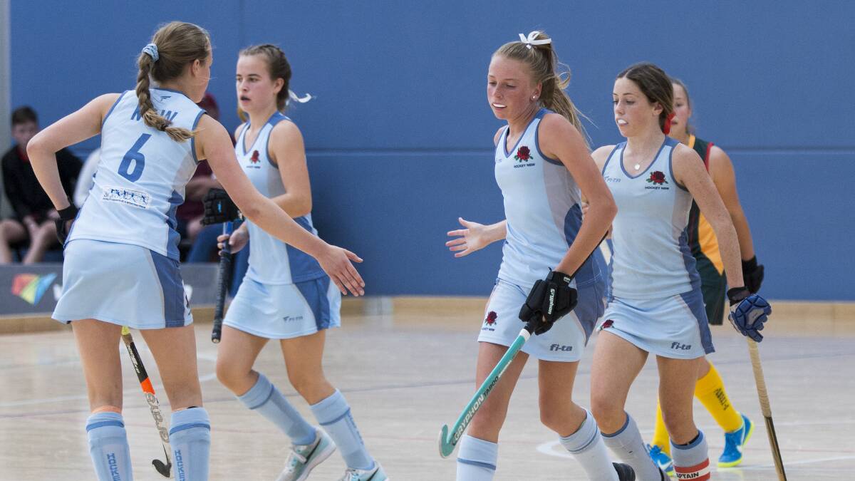 GOING FOR GOLD: Emily Thompson with the NSW under 15 girls indoor hockey team in Goulburn. Picture: GREG THOMPSON/ CLICK INFOCUS. 