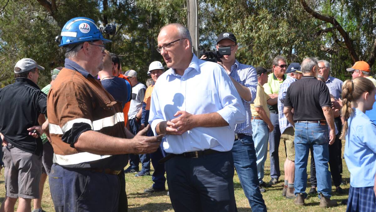 VISITING SPRINGVALE: Opposition leader Luke Foley speaks with a Springvale miner after his address opposite the mine. Picture: PHOEBE MOLONEY. 