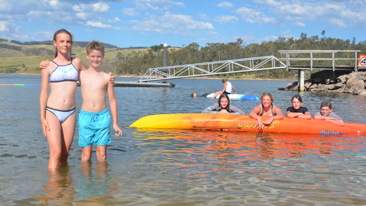 COOL: Zuzana and James Walton, Estelle Hawkins, Juliet Robinson, Sean and Dan Ryan cooling down at Lake Lyell on Friday, January 5. Picture: PHOEBE MOLONEY. 
