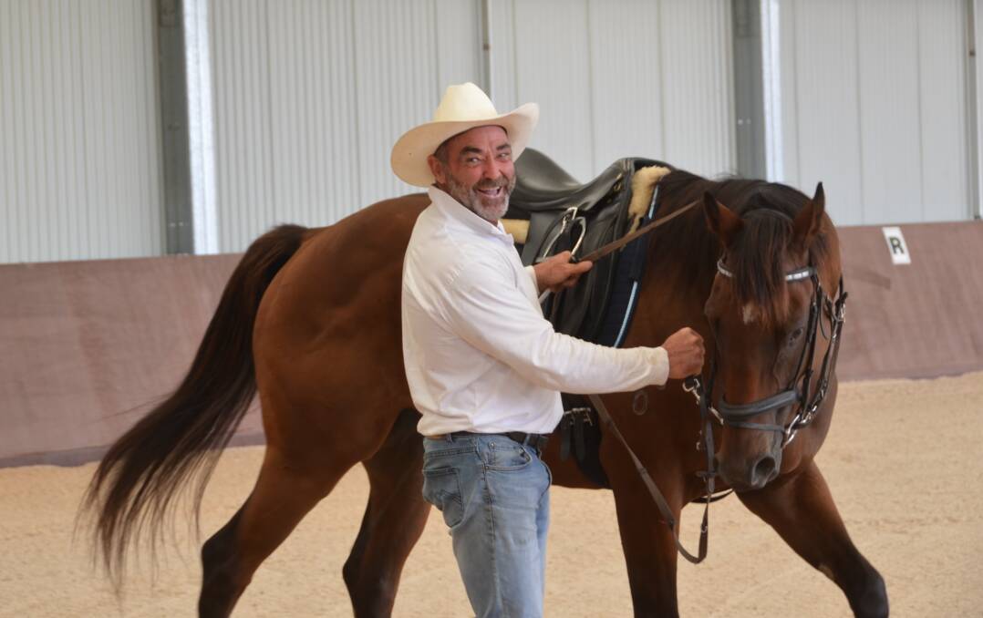 REHABILITATION: Scott Brodie, manger of the Racing NSW Thoroughbred Retraining Program with 'Vaschka', a former racehorse at Bandanora. Picture: PHOEBE MOLONEY. 