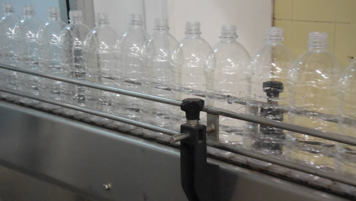 FACTORY LINE: Bottles of water in the Lithgow Valley Springs factor. Picture: PHOEBE MOLONEY. 