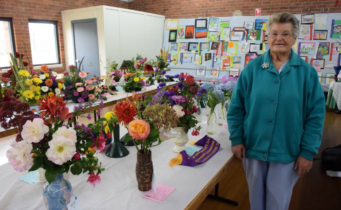 Maureen Ford and her great-grandson share a love of flowers. A passion rewarded at this year's Lithgow Show.