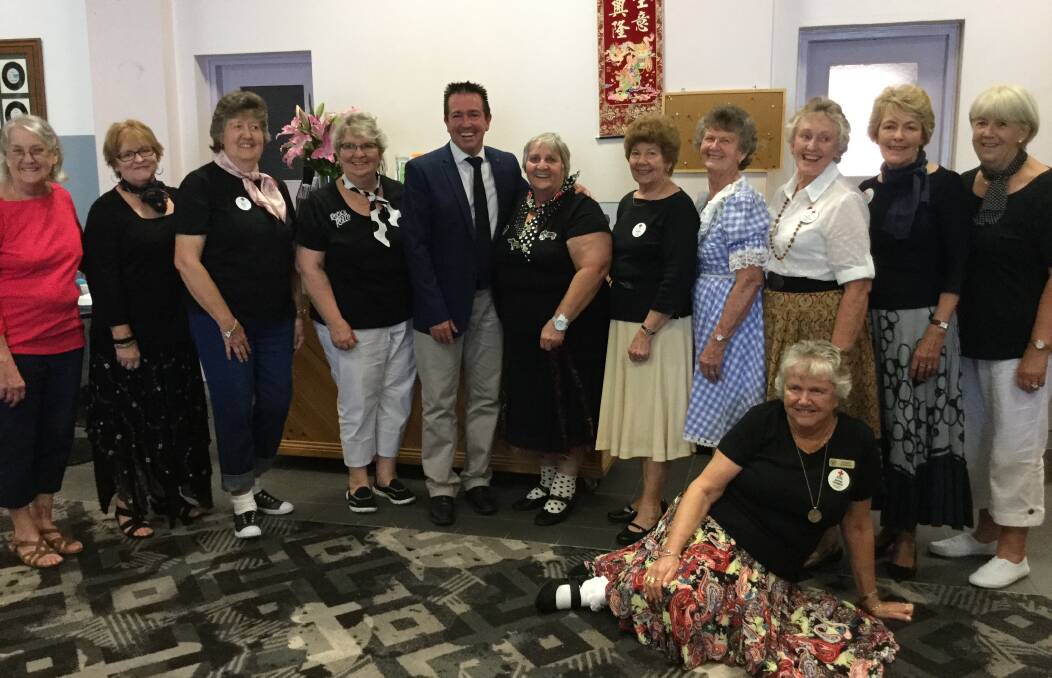 SWING TIME: Lithgow Red Cross branch members and Paul Toole MP celebrate the branch's 81st year with a rocking lunch. Picture: SUPPLIED