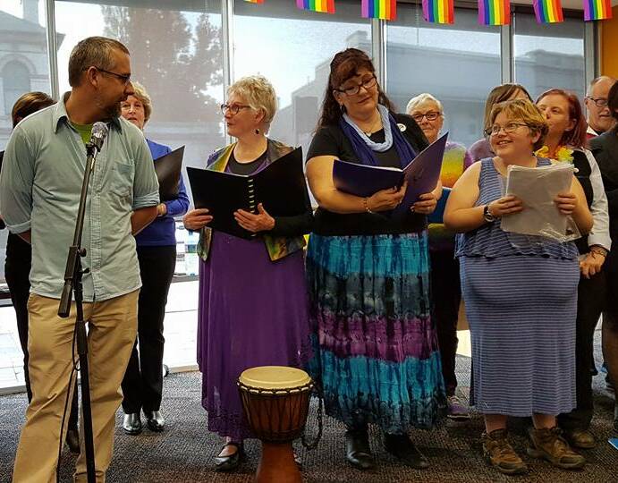SHARING STORIES: Lithgow Community Choir sang at the town's first IDAHOT celebrations led by Rainbow Lithgow member Rowen Fox. Picture: SUPPLIED