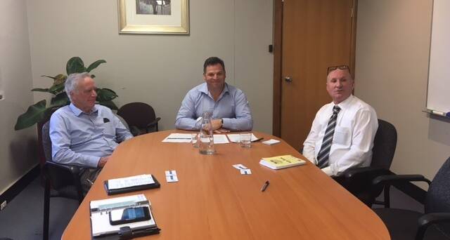 AT THE TABLE: Lithgow City Council Mayor Stephen Lesslie, Orange MP Philip Donato and council general manager Graeme Faulkner. Picture: SUPPLIED. 