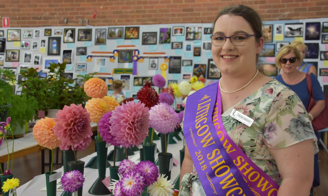 SASHED: Elyse Hudson at the flower display at the 2018 Lithgow Show. Picture: PHOEBE MOLONEY. 