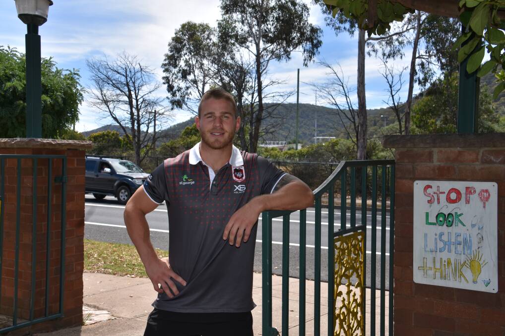VISITING: Euan Aitken of the St George Illawarra Dragons standing at Cooerwull School gates. Picture: PHOEBE MOLONEY.