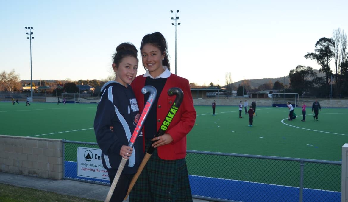 STICK SISTERS: Lily, 11, and Hannah, 16, have been selected for state squads competing at the Pacific School Games. Picture: PHOEBE MOLONEY. 