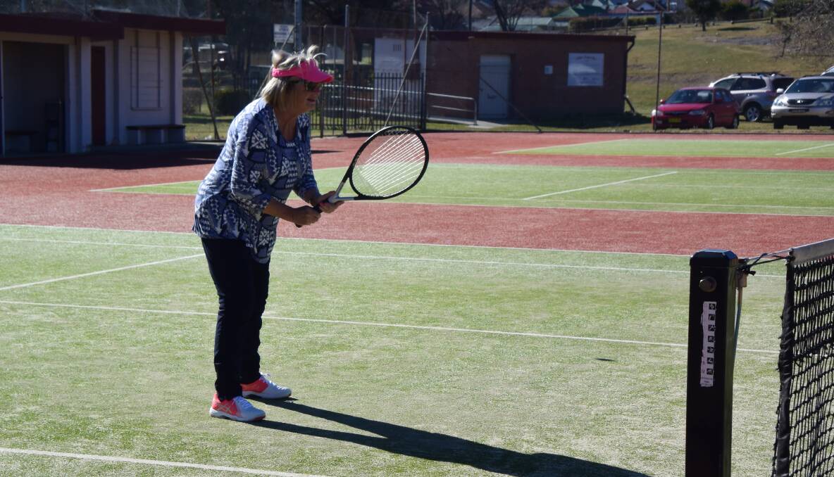 Carolyn Andison gets ready to return a serve at Lithgow tennis court. 