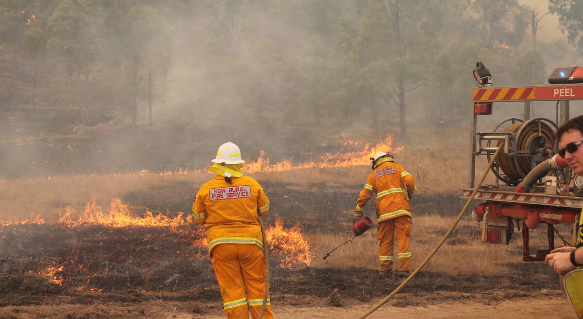 Fire crews work to extinuishing fires in the Mid Western Region which have now been brought under control. Photo: SAM POTTS