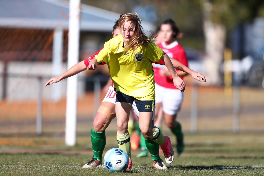 ALMOST THERE: Cushla Rue and her fellow Western NSW Mariners FC players only need a draw in the last round to qualify for finals. Photo: PHIL BLATCH
