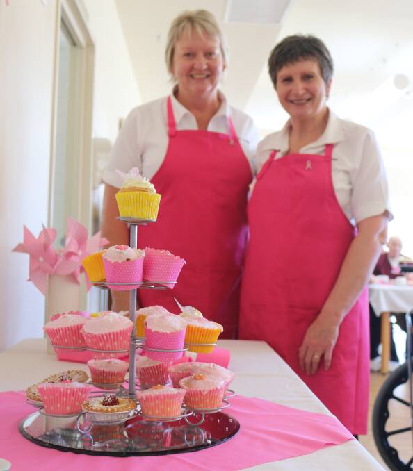 PINK RIBBON DAY HIGH TEA: Three Tree Lodge kitchen managers Narelle Croucher and Kathy Muldoon.