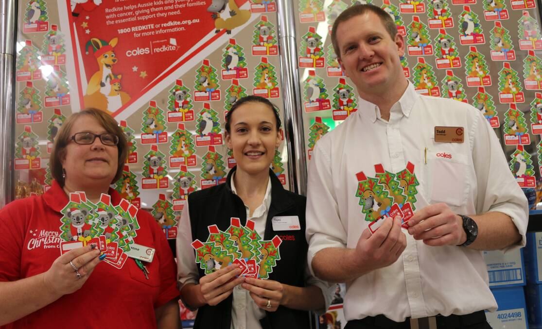 'GIFT'CARD: Lithgow service manager Leanne Smith, support manager Toni Cooper and store manager Todd Pangas in front of the gift cards already received.
