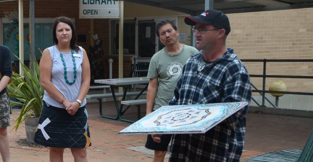 SPECIAL GIFT : Lithgow TAFE student Jason Horne completed a painting and presented it to the college.