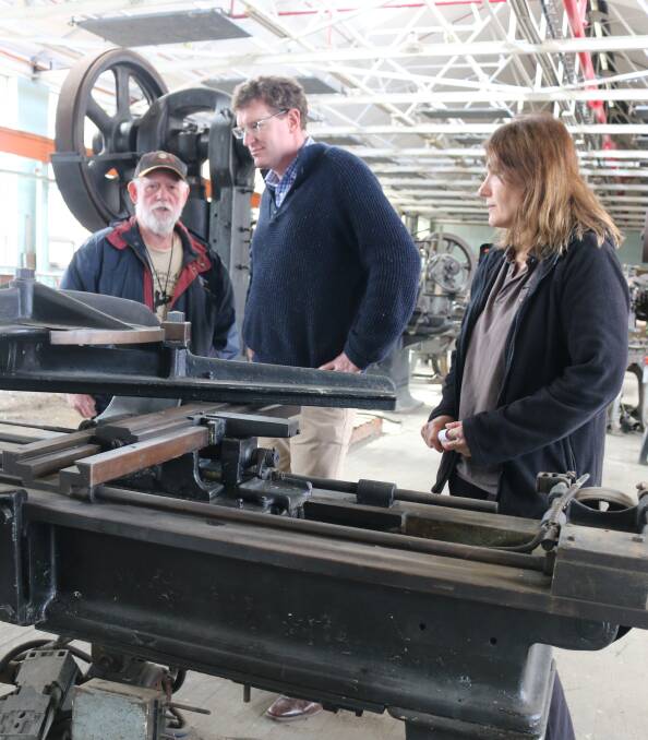 PLANNED FOR FUTURE DISPLAY: LSAFM's secretary Kerry Guerin runs Calare MP Andrew Gee through the rifling machine with LSAFM Custodian Donna White.